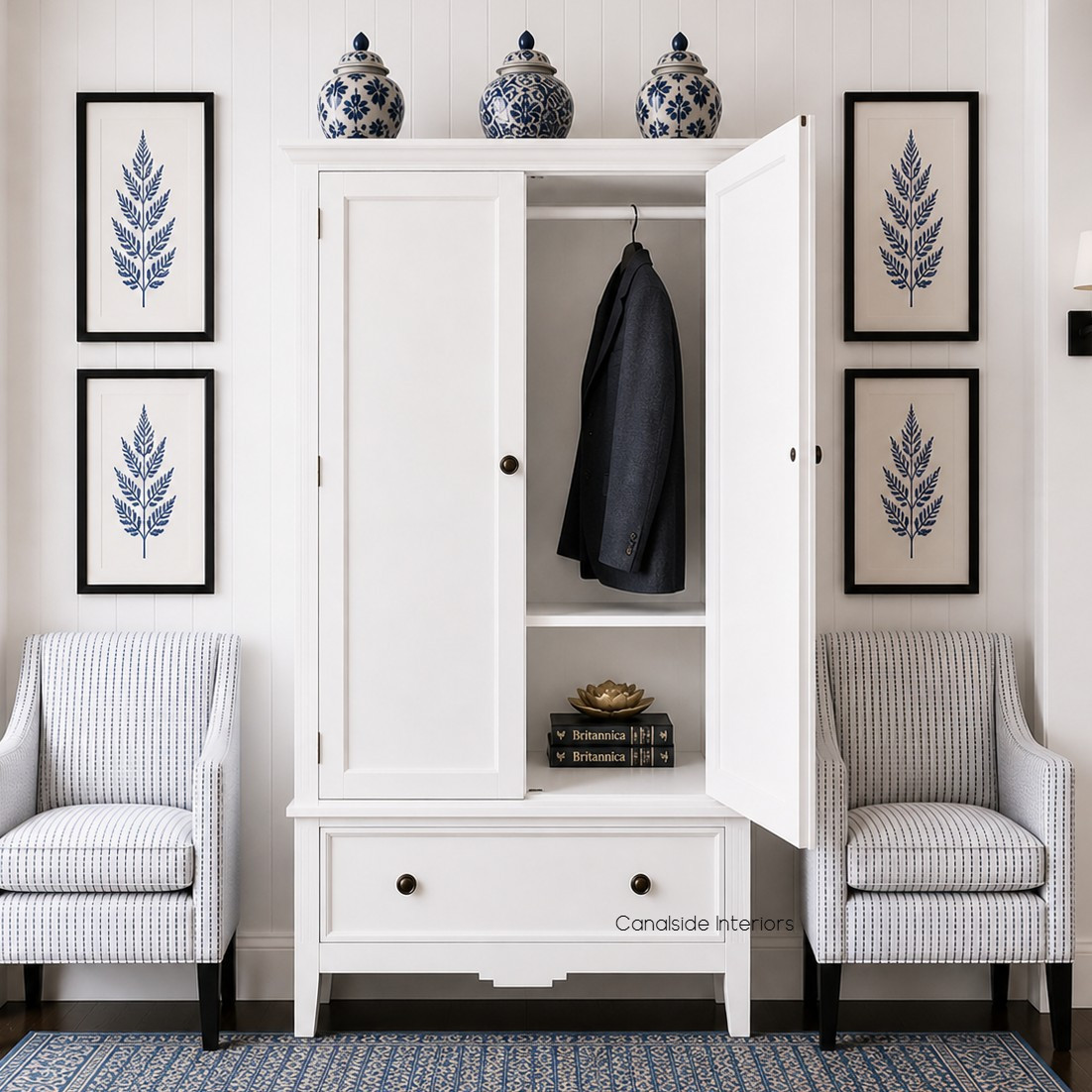 Frontal view of the Peninsula Wardrobe in white in situ in a modern hamptons home, showcasing its classic elegance and suitability for Hamptons-style interiors.