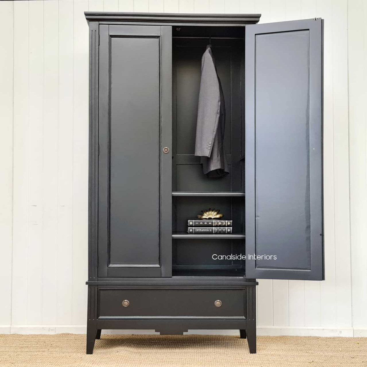 Frontal view of the Peninsula Wardrobe in black, showcasing its classic elegance and suitability for Hamptons-style interiors.