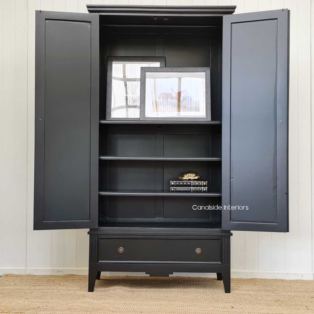 Interior view of the wardrobe, demonstrating its spacious storage capabilities and practical organisation options.