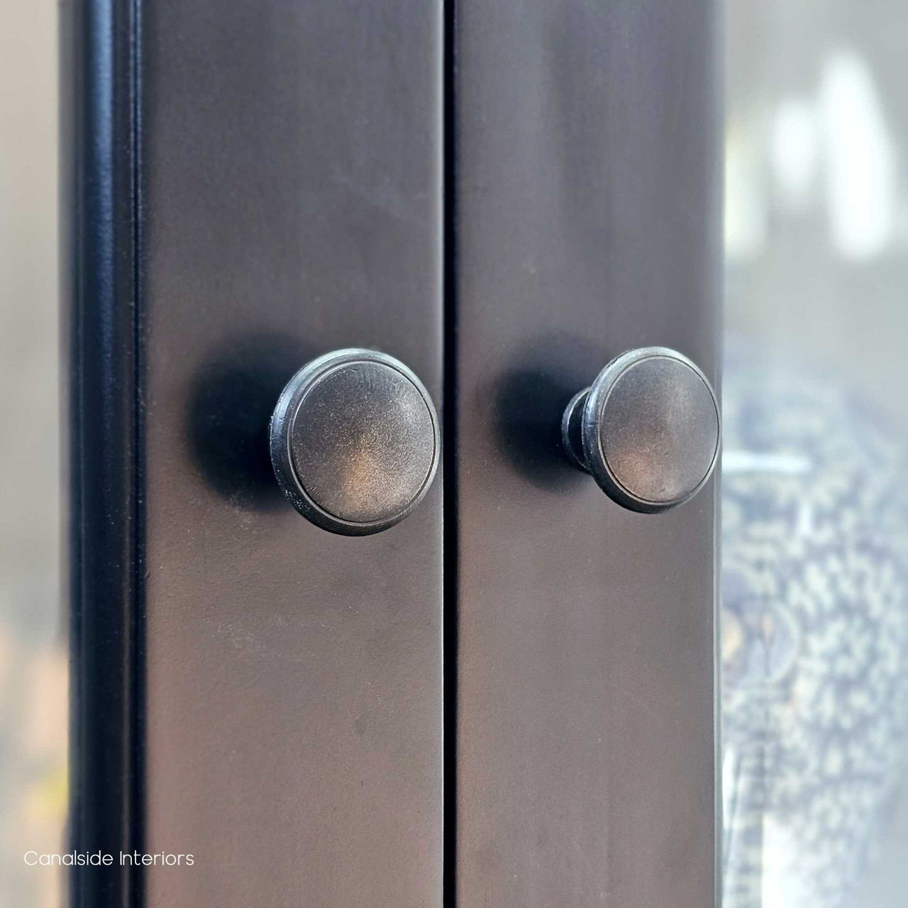 Close-up of the drawer handles, showcasing the fine detailing and quality materials used in the Key Largo Display Unit.