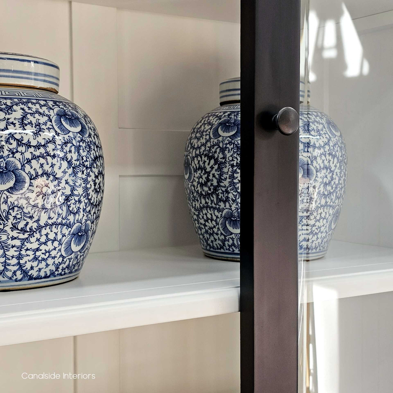 Close-up of the interior shelves, highlighting the spacious and well-organised storage of the Key Largo 4 Door Display Unit.