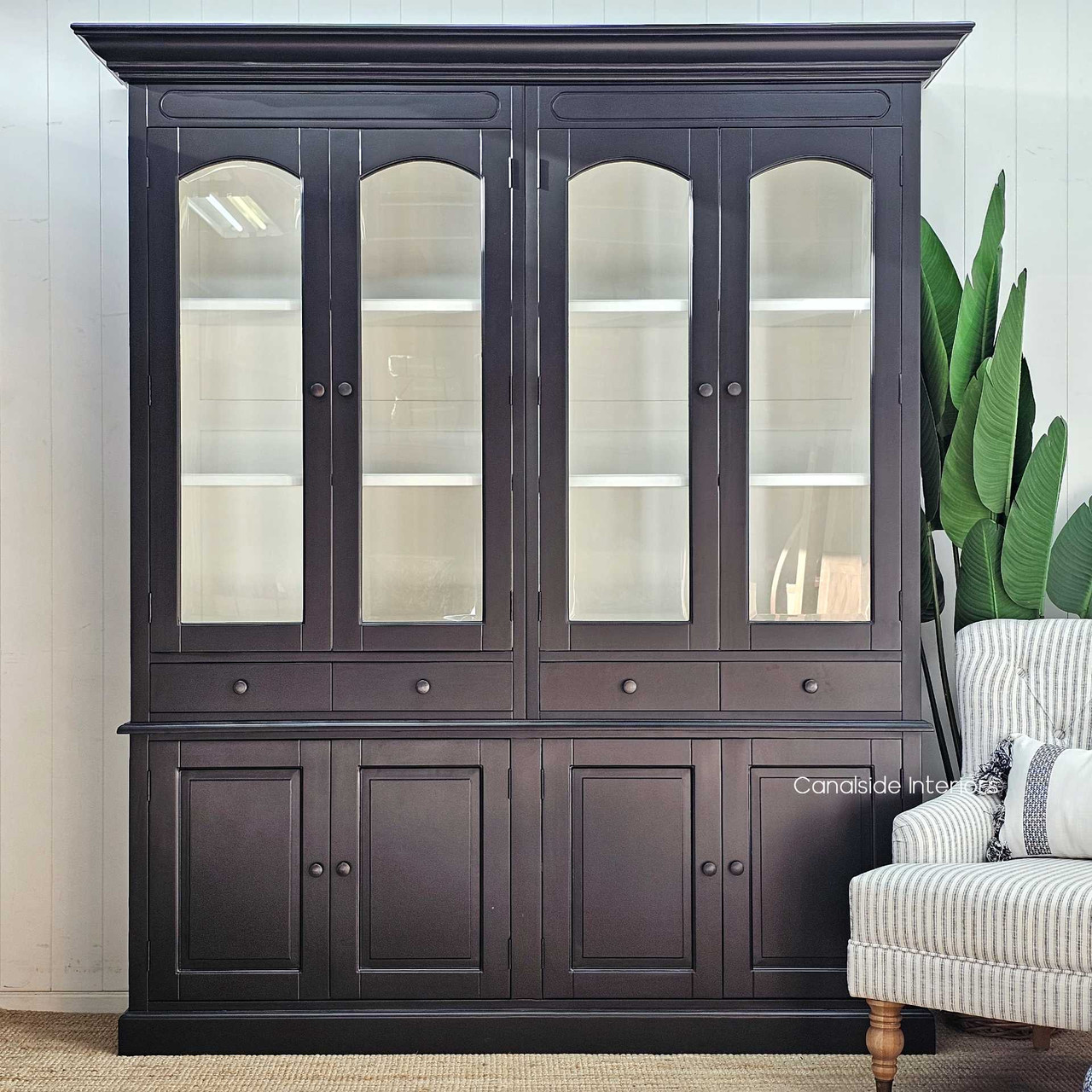 Front view of the Key Largo 4 Door Display Unit without accessories showcasing its elegant black exterior with a contrasting white interior.