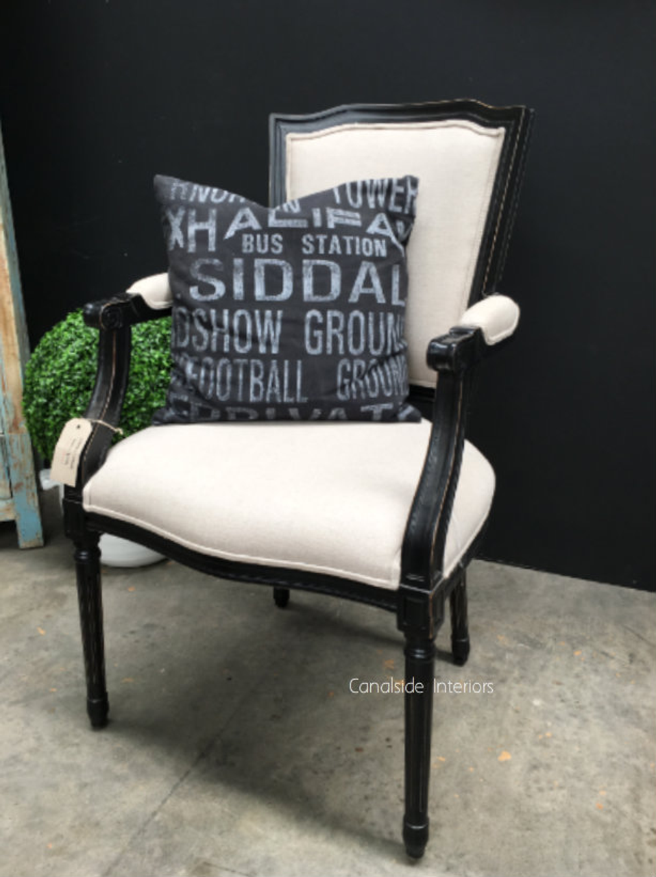 A testament to craftsmanship and elegant design, the Stark Carver Chair by Canalside Interiors adds an air of classical luxury to your home deco