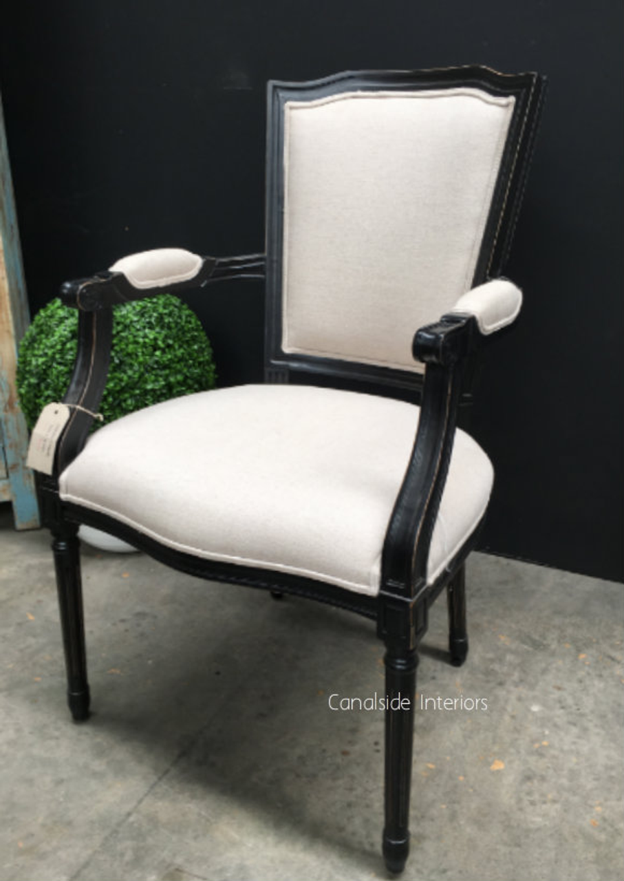 Perfect for both casual and formal settings, the Stark Carver Chair at Canalside Interiors blends seamlessly with your unique style