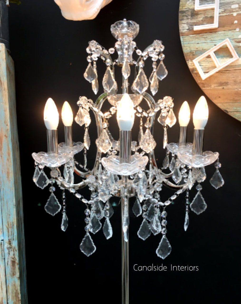 The Florian Silver Lamp's rust frame and crystal detailing infuse classical quality into your living room decor