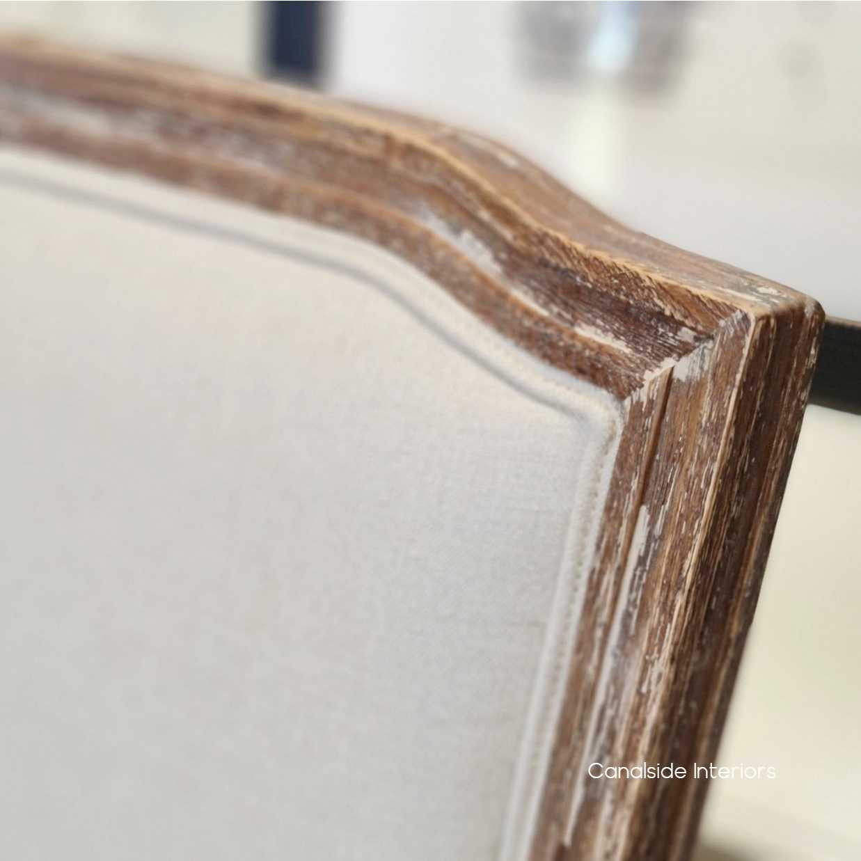 Discover the allure of coastal design with the Stark Dining Chair's weathered oak finish, a modern classic for your home - Canalside Interiors