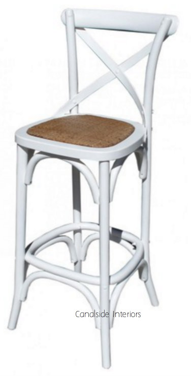 The side profile of Canalside Interiors' distressed white Cross Back Bar Stool showcases the elegant curves and craftsmanship, ideal for adding a touch of coastal charm to your kitchen bar