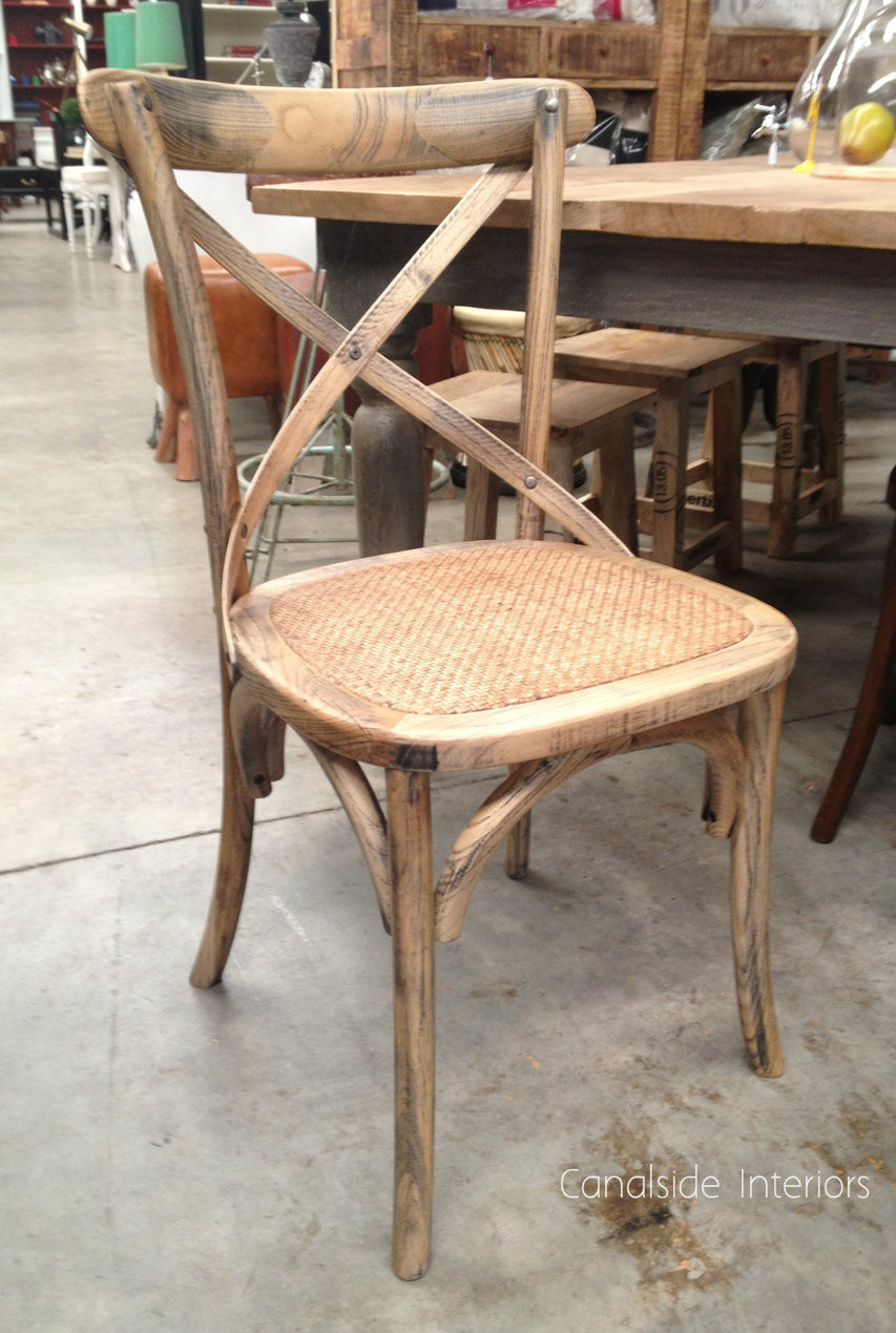 Luxury meets tradition in this Natural French Oak Cross Back Chair, a feature piece for any discerning lounge room