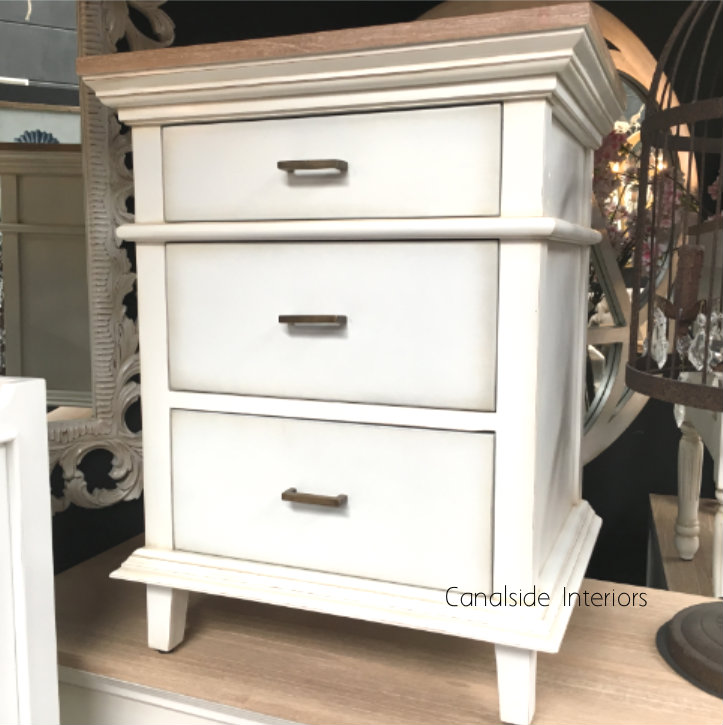 Detail of the bedside's overall design, blending architectural classicism with a hint of modern simplicity.