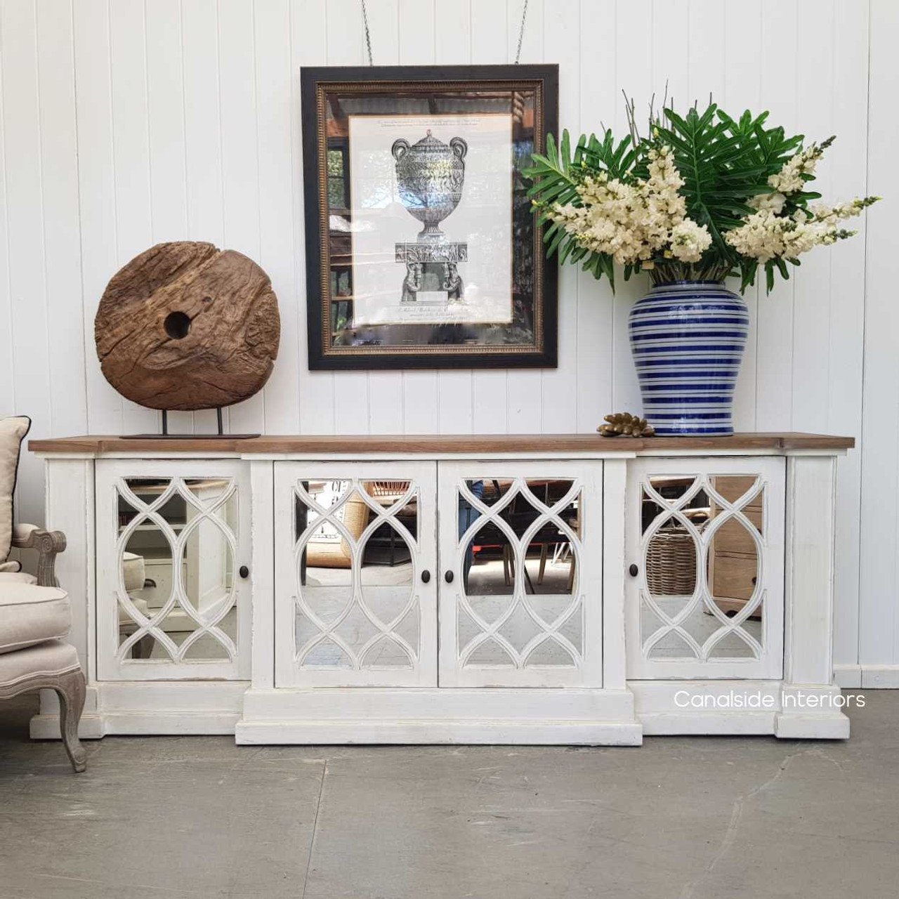 A lifestyle image of the Marielle Sideboard used as a media unit, illustrating its adaptability and functionality in modern living spaces.
