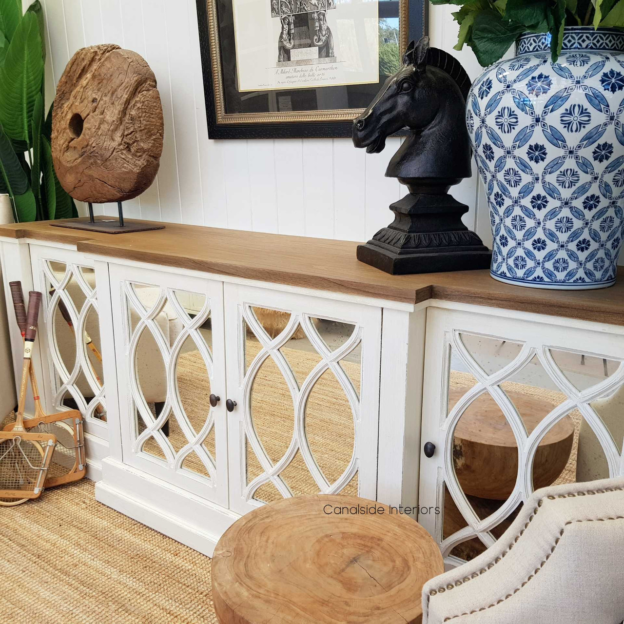 The Marielle Sideboard as a sophisticated storage solution in a library setting, blending functionality with elegant design.