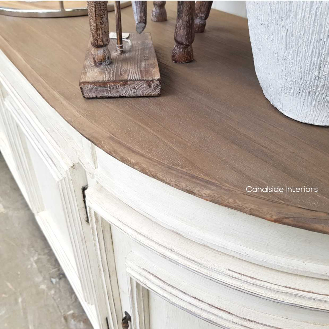 For homes that celebrate the grandeur of the Hamptons or Colonial Plantation styles, the Francia Sideboard with a weathered oak top is a perfect match
