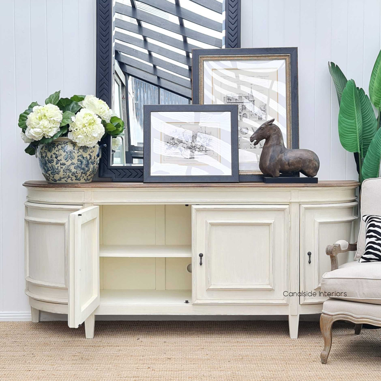 Elevate your library's charm with the Francia Sideboard, combining a stone finish with a weathered oak top for a provincial feel that complements both modern and classical themes