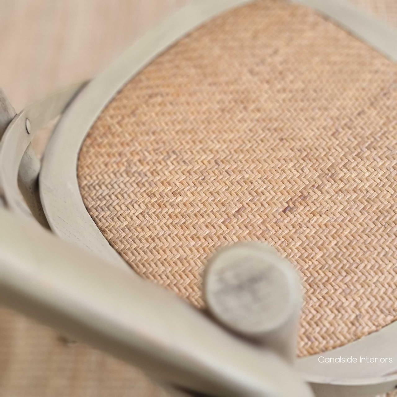 Refine your lounge room with the elegant Cross Back Chair in greywash, capturing the essence of coastal luxury