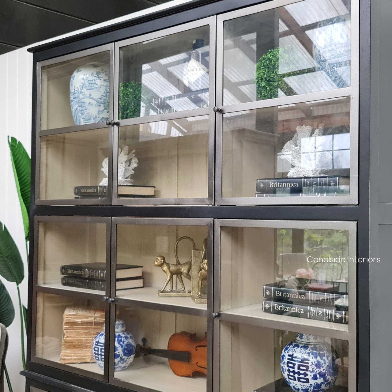 View focusing on the distressed finish and detailed workmanship, adding character and depth to any interior space.