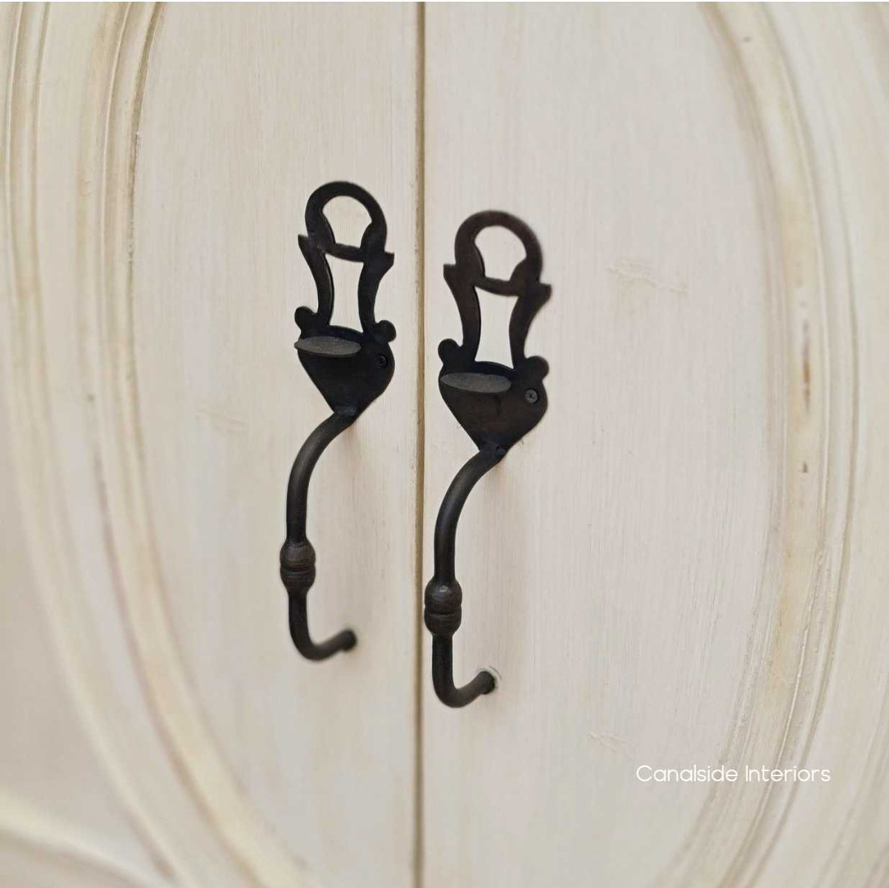 Close-up of the sideboard's handles, featuring detailed design that complements its French provincial character.
