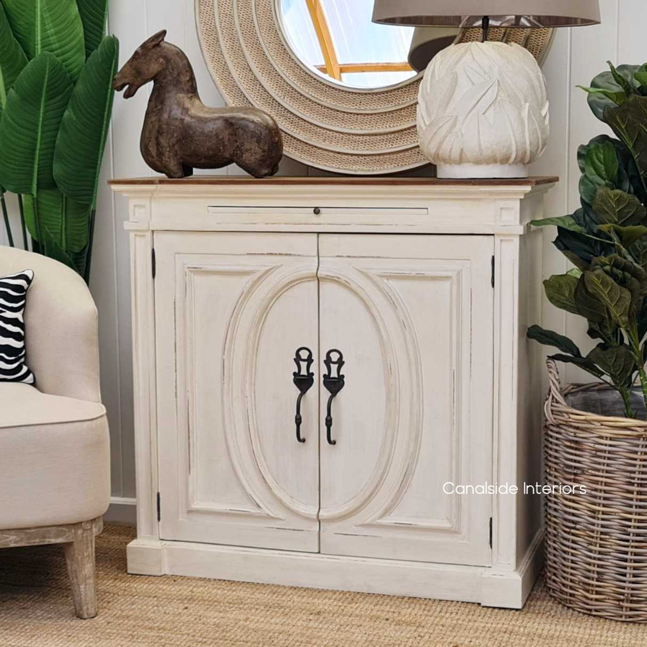 Styled setting of the Marmont Sideboard in a living room, demonstrating its versatility and storage capacity.