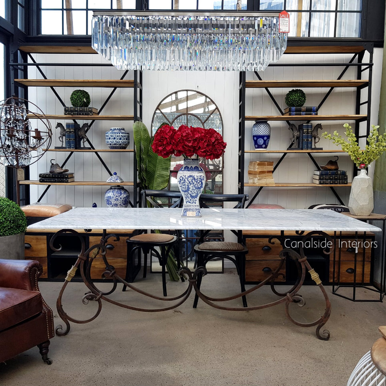 Infuse your dining space with the timeless charm and modern sparkle of the Odeon Rectangular Chandelier for a truly Canalside Interiors experience.