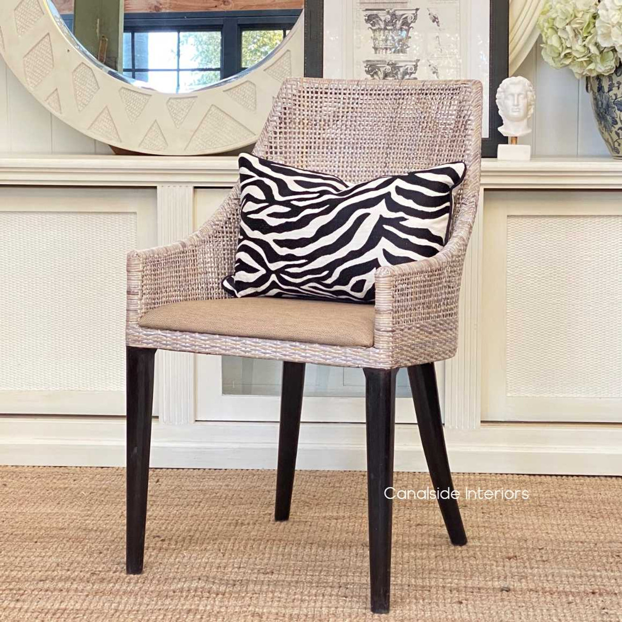 The Wickham Chairs as part of an elegant lounge setup, illustrating how they can transition beyond the dining room.