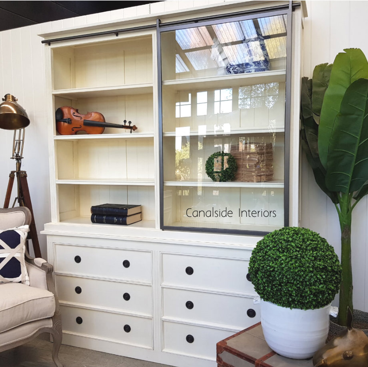 Cozy reading nook setup with the Pemberley Unit, creating a serene space for relaxation and display.