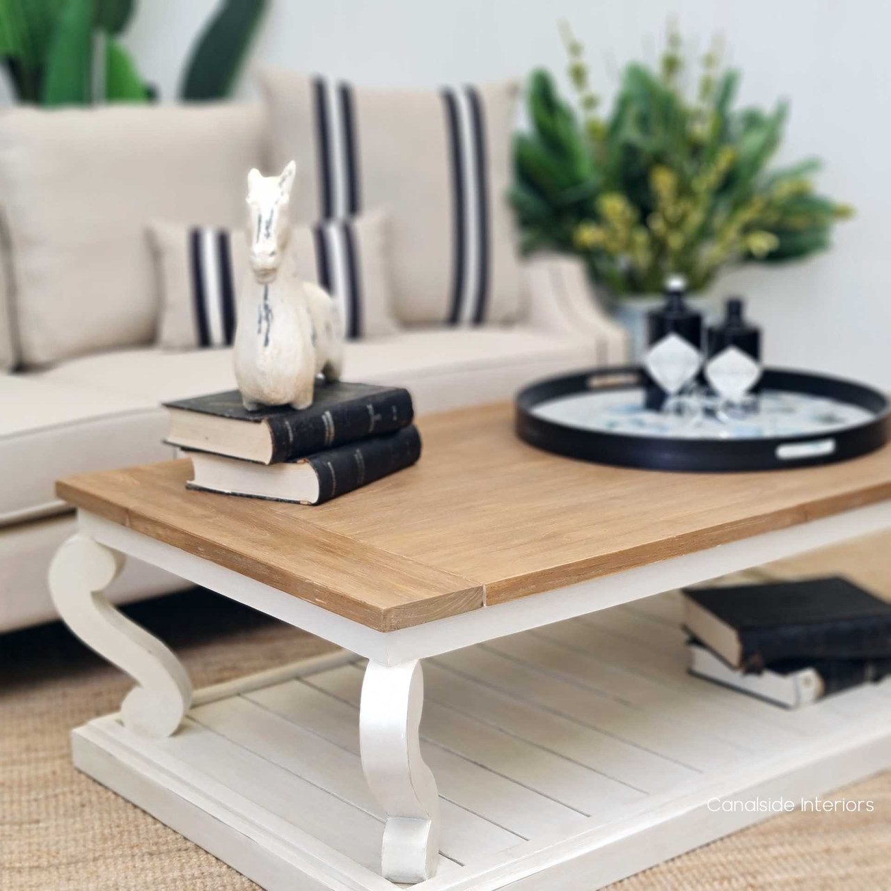 Angled shot illustrating how the coffee table complements a classical interior, adding a layer of richness and depth.