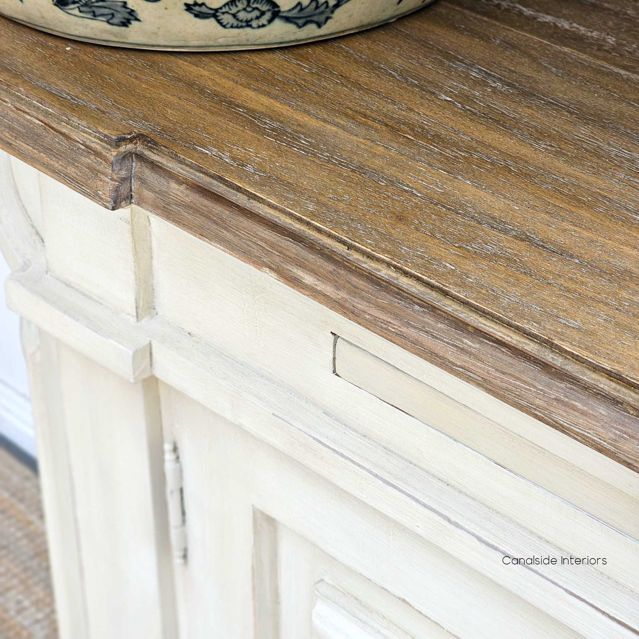 Detailed close-up of the weathered oak top, highlighting the quality and texture that is synonymous with Canalside Interiors' French furniture collection."