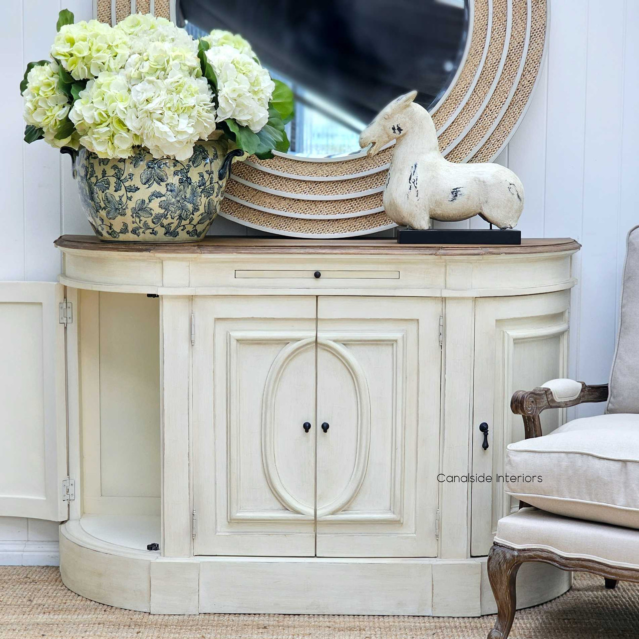 Focused on the intricate detailing, this image captures the Bastian's unique charm, suitable for sophisticated storage in any living space