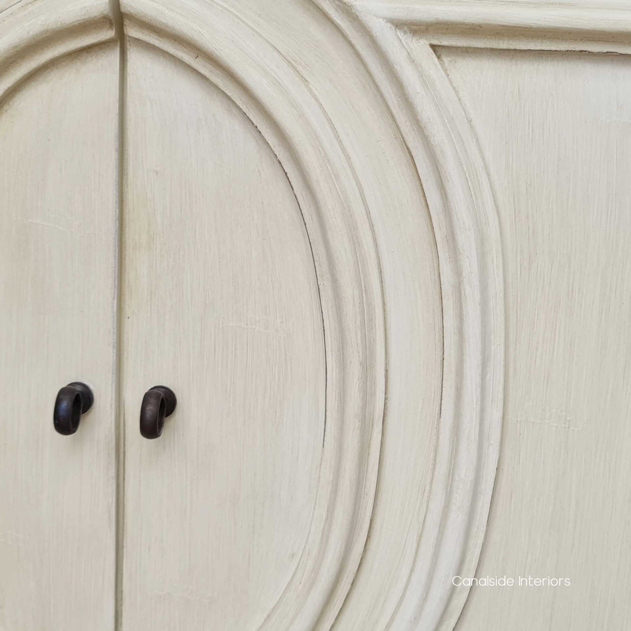 The intricately designed knobs on the Bastian Sideboard underscore Canalside Interiors' attention to detail and craftsmanship, enhancing the piece's coastal charm