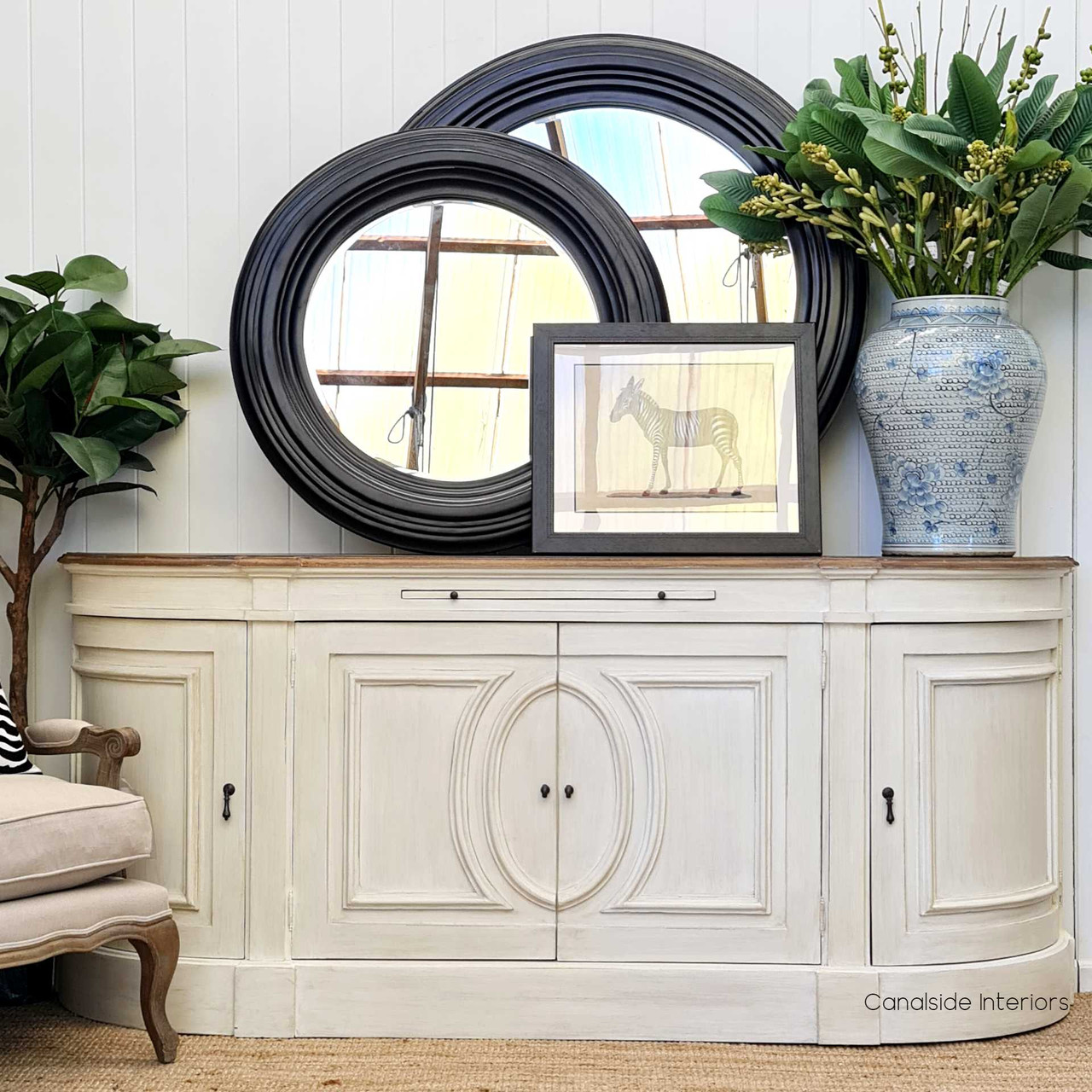 The Bastian Large Sideboard shows off its generous dimensions, ideal for adding a statement storage piece to a library or home office.