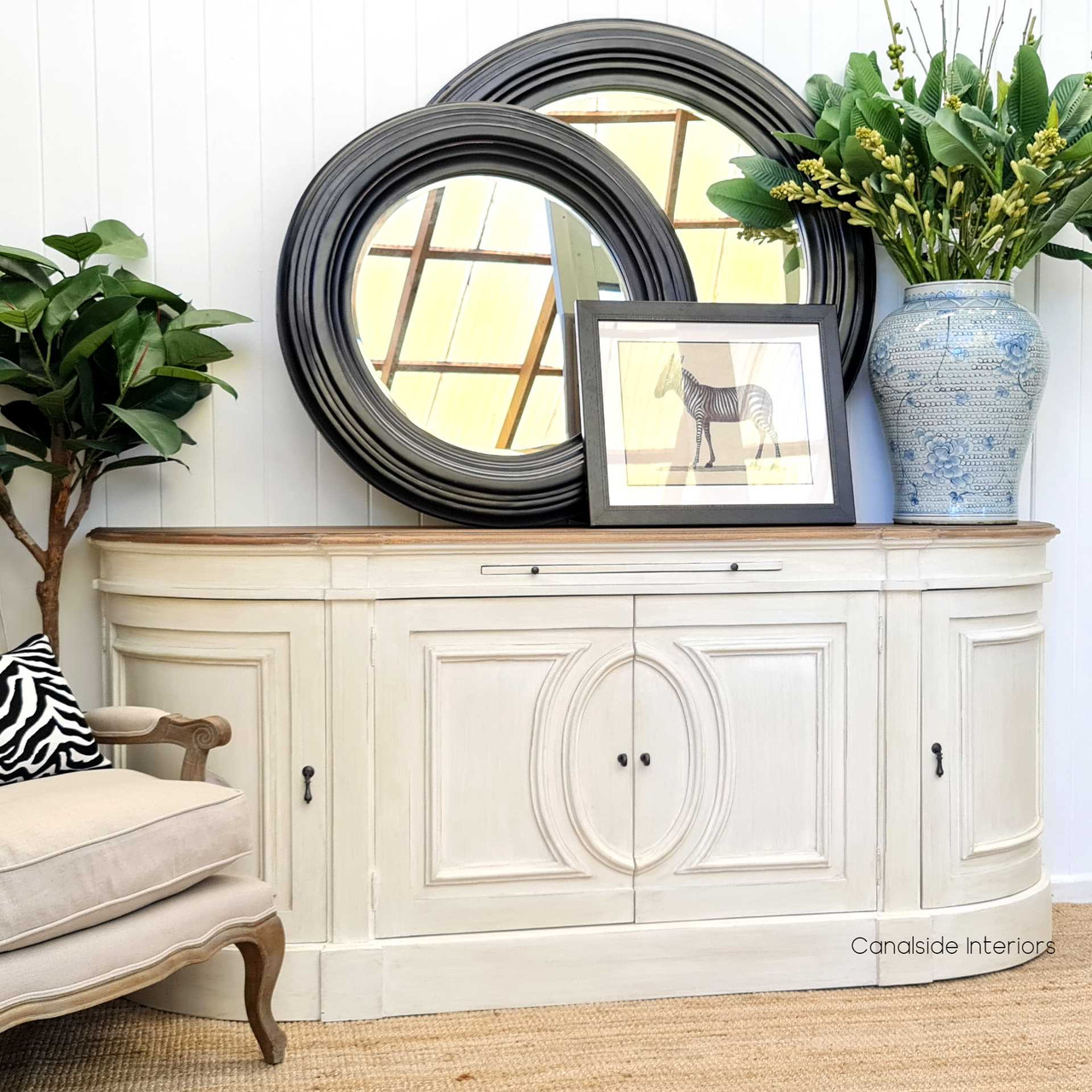 From a side perspective, the Bastian Large Sideboard's stone finish exudes classical elegance, making it a perfect addition to coastal-inspired interiors