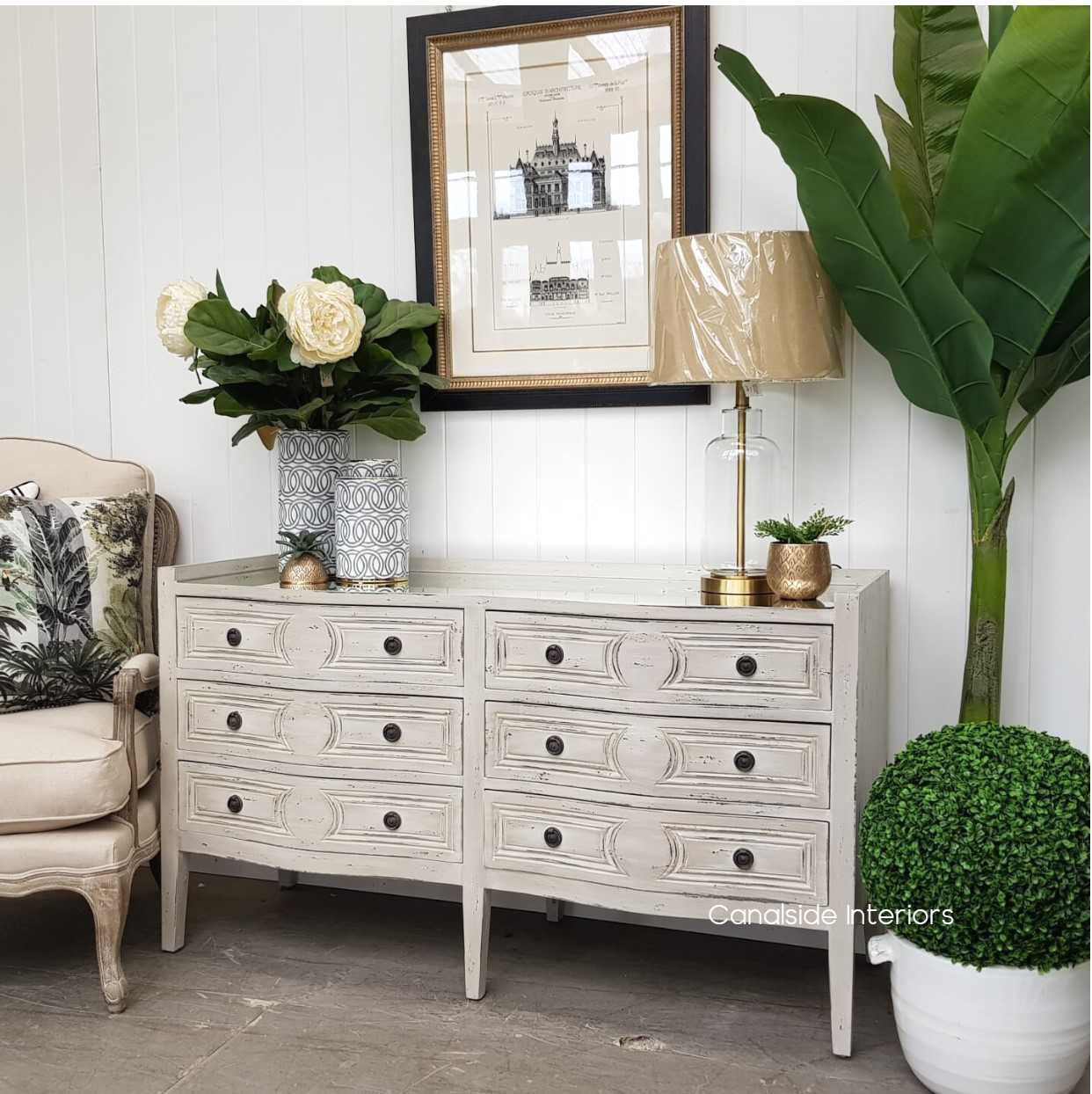Elevate your living room's aesthetic with the grey, weathered charm of the Isobel Grande Chest, a modern twist on classical French furniture – Canalside Interiors
