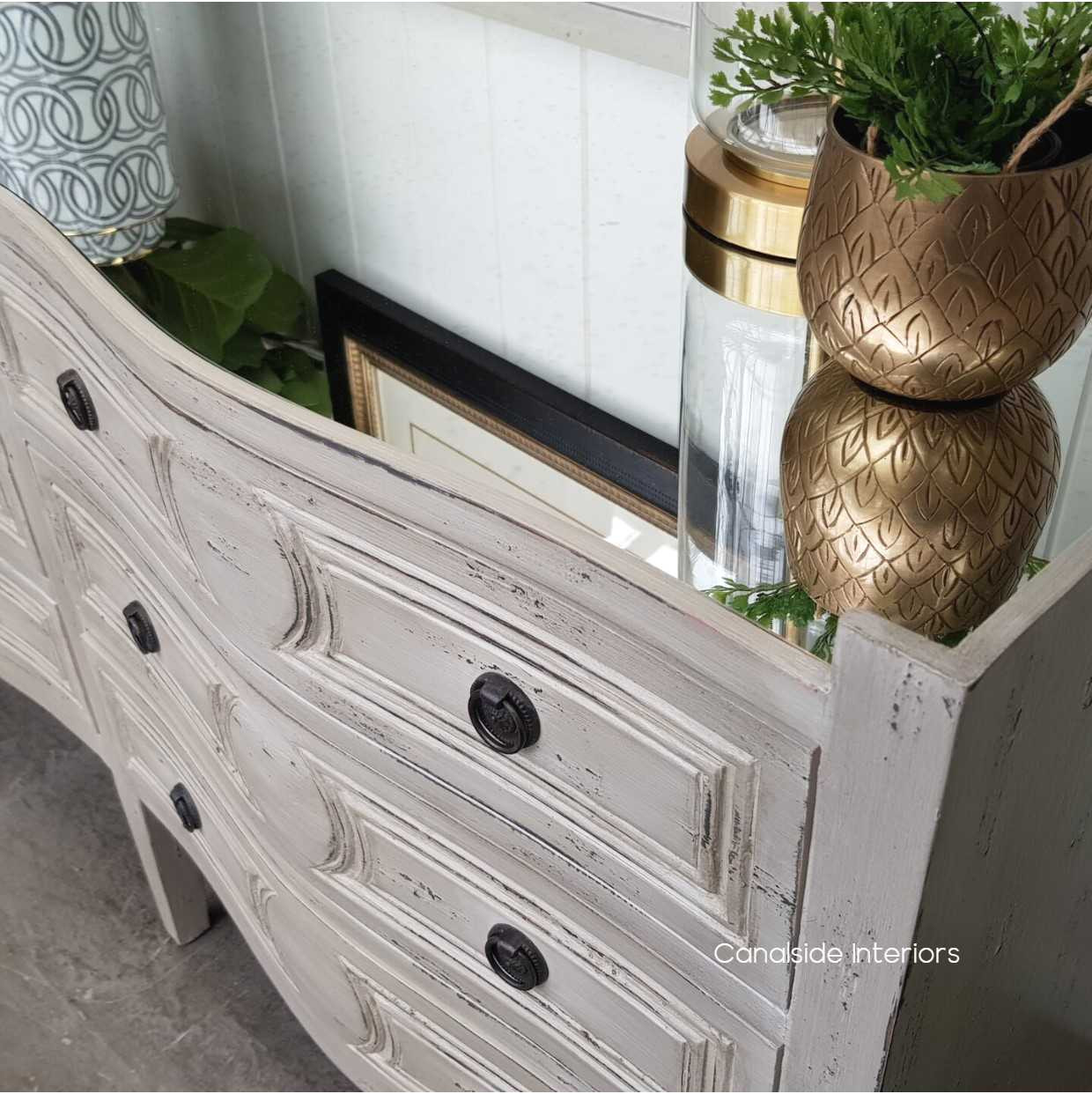 Adorn your living space with the Isobel Grande Chest, where the allure of French-inspired craftsmanship meets the chic distressing for an unmatched coastal theme – Canalside Interiors