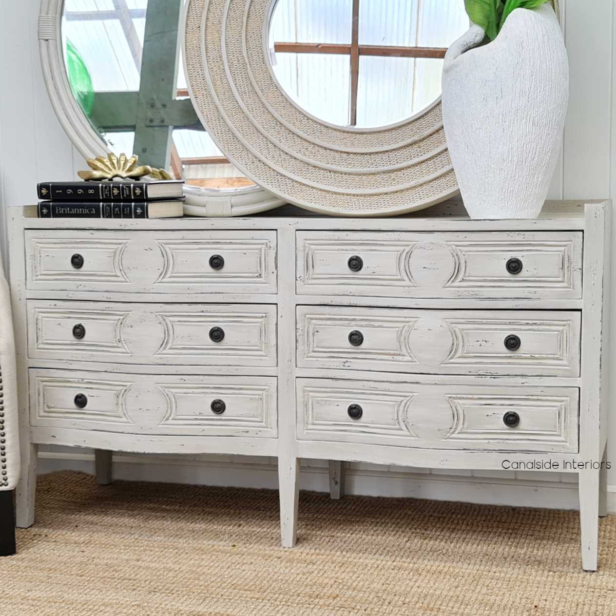 Exquisite hand-crafted design meets functional elegance in this grey distressed chest, enhancing any dining room – Canalside Interiors