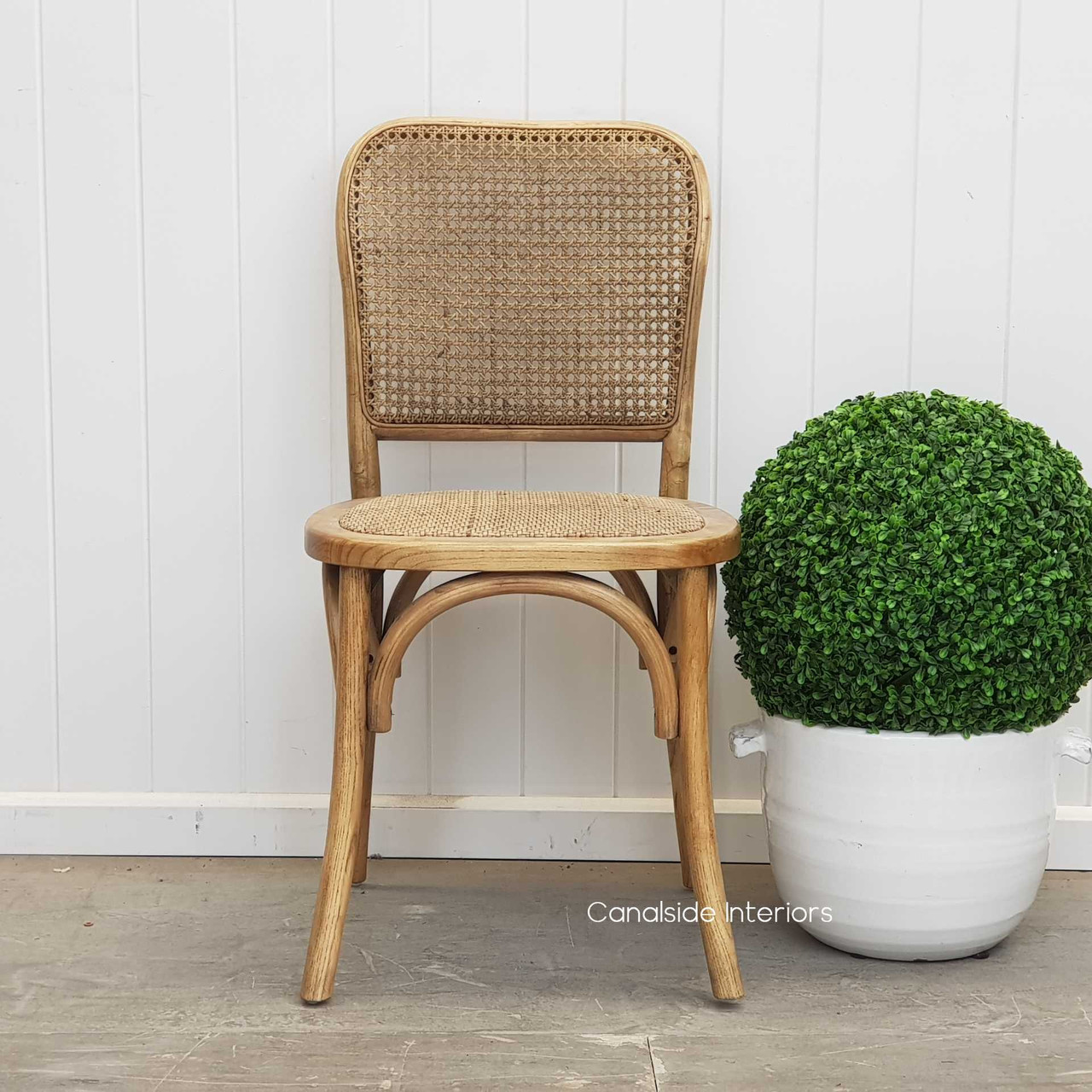 The Natural Oak Saxon Chair by Canalside Interiors, infusing your bedroom with a touch of coastal serenity