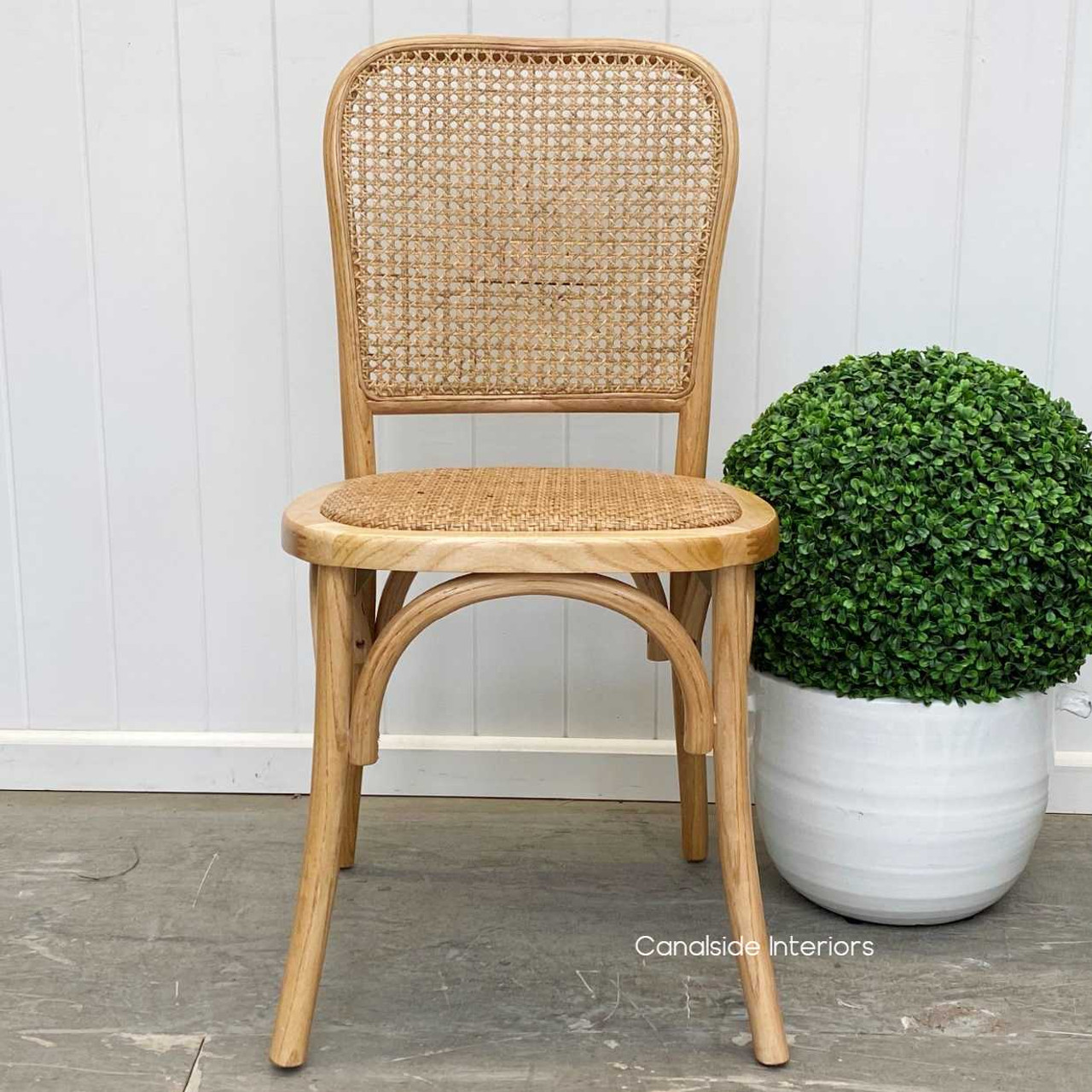 Bring the timeless charm of the Saxon Bentwood Chair to your modern dining space for a blend of comfort and style - Canalside Interiors