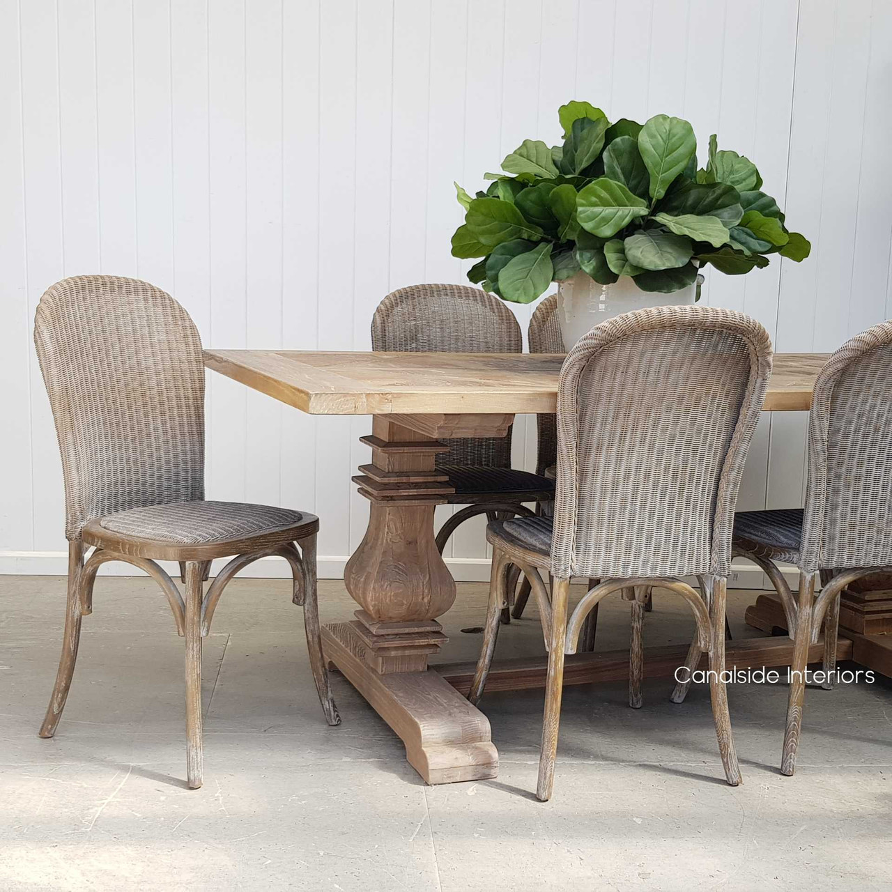 The Cape Colony chair set in a Hamptons-style dining room, accentuating its elegance and versatility in decor.