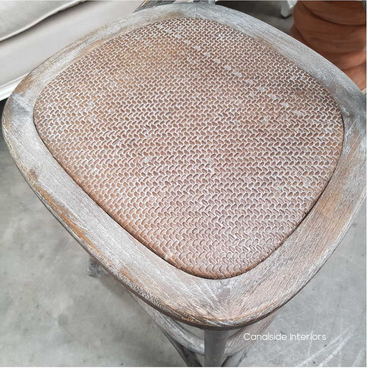 Aerial perspective of the rattan seating on the Grey Oak Kitchen Stool, a testament to Canalside Interiors' commitment to timeless, quality furnishings.