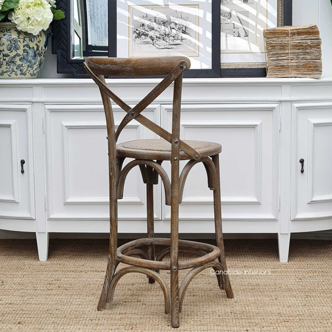 Perfect for kitchen use, this Cross Back Stool captures the essence of Hamptons luxury with its durable design and inviting finish