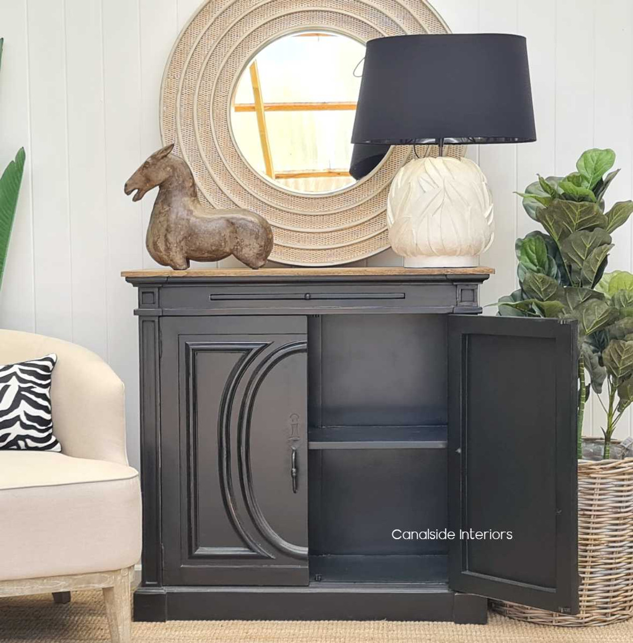 Styled setting of the Marmont Sideboard in a living room, exemplifying its versatility and ample storage capacity for a clutter-free space.