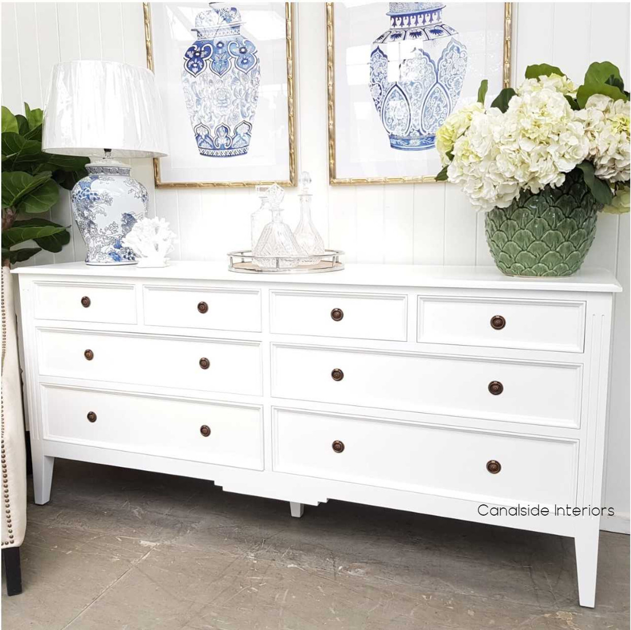Styled within a chic living room, demonstrating the sideboard's versatility and appeal in modern and traditional settings.