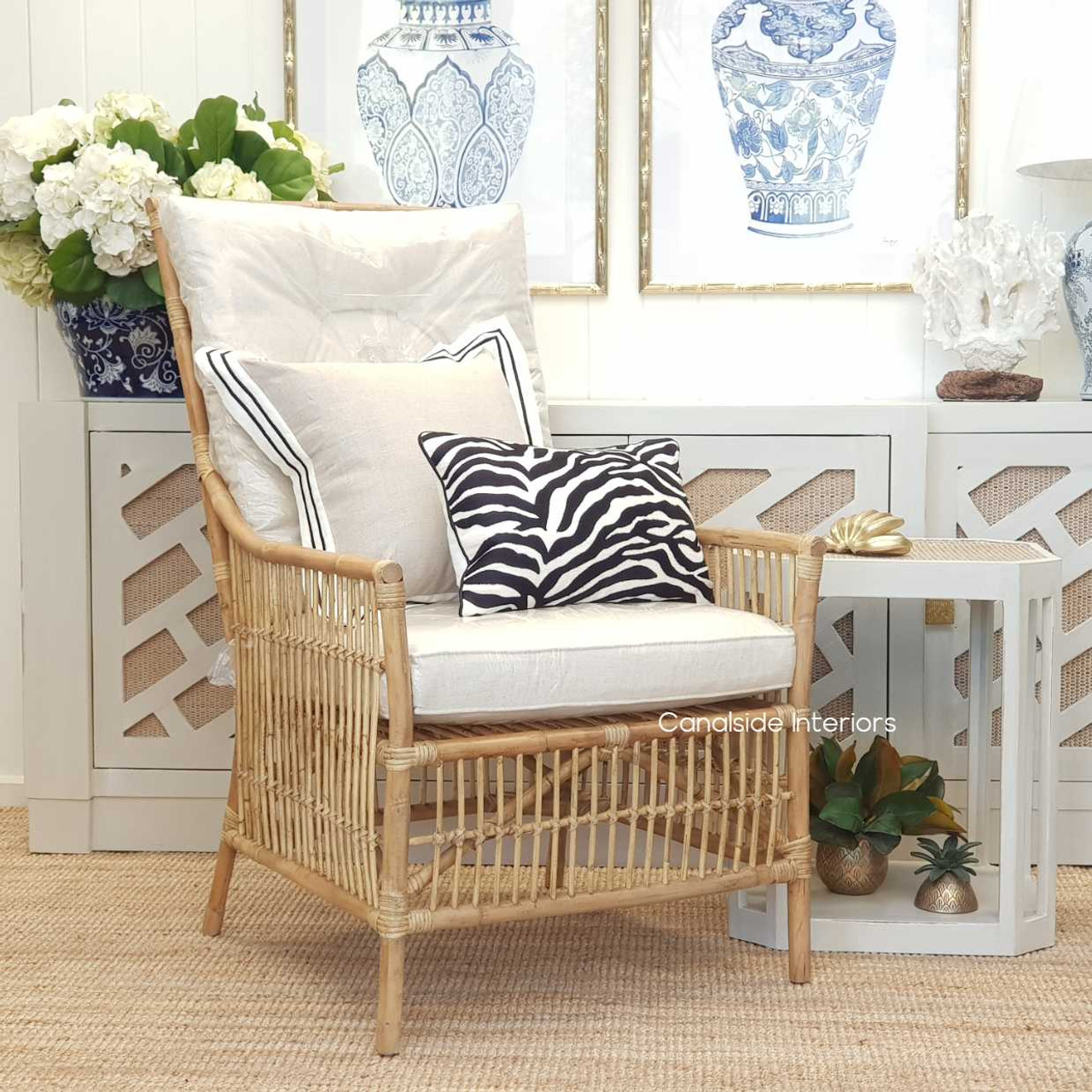 Classic Plantation-style Raffles Armchair with natural cane for a timeless library aesthetic - Canalside Interiors