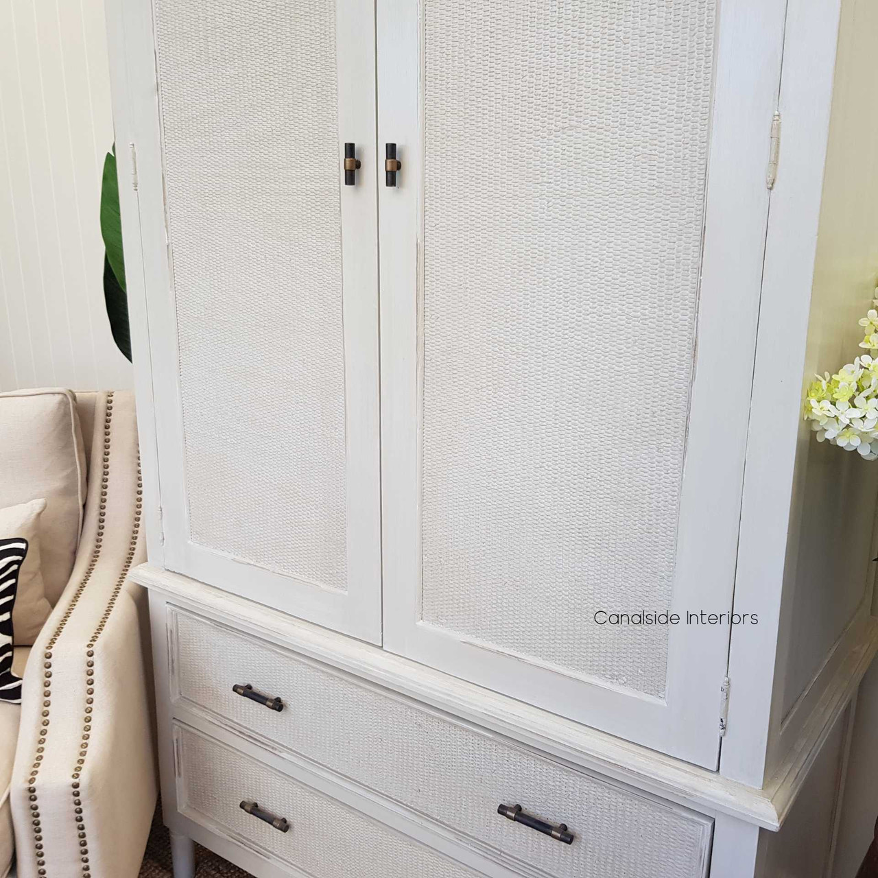 Profile of the wardrobe against a neutral backdrop, illustrating its sleek design and harmonious integration with various interior styles.