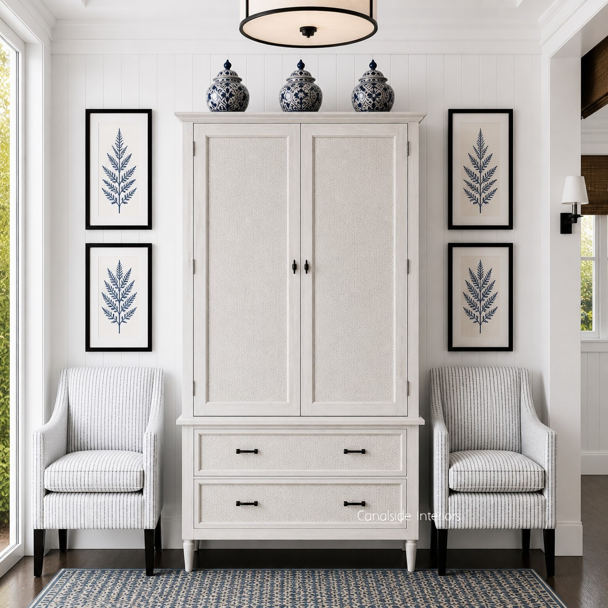 Frontal view of the Brielle Rattan Wardrobe Cupboard in situ at Canalside Interiors, showcasing its distressed stone finish and stone rattan detailing.