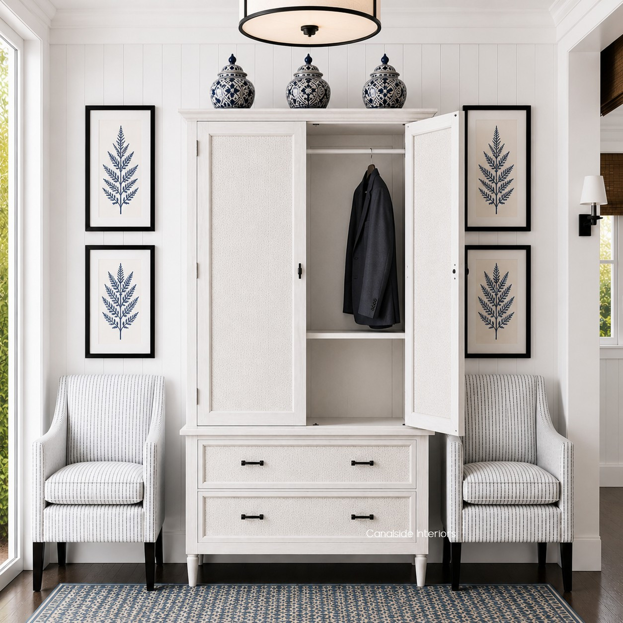 Front perspective of the Brielle Rattan Wardrobe Cupboard with door open in situ at Canalside Interiors, showcasing its distressed stone finish and stone rattan detailing.