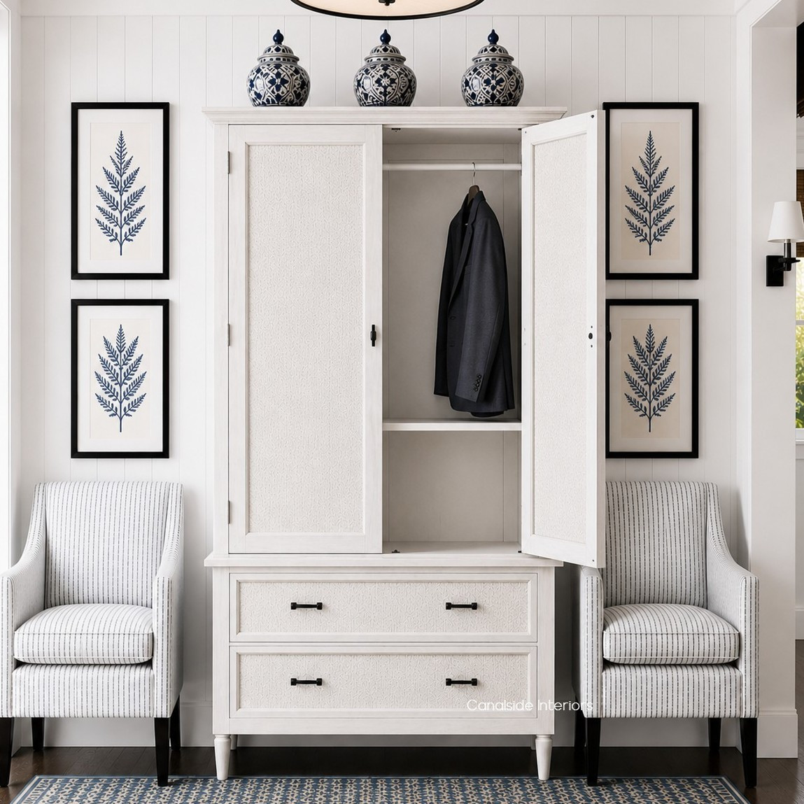 Front on view of the Brielle Rattan Wardrobe Cupboard with door open in situ at Canalside Interiors, showcasing its distressed stone finish and stone rattan detailing.