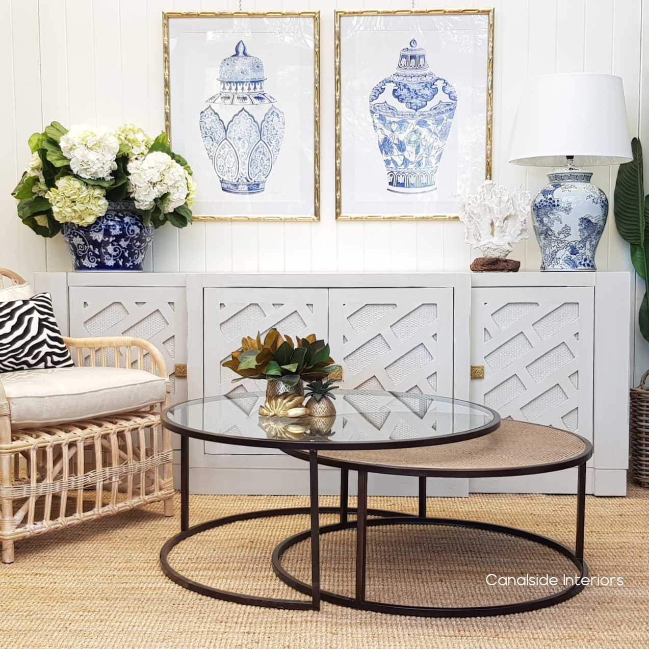 Accent your living room with the Knox Nesting Tables, where the luxurious brass frame meets the casual chic of rattan