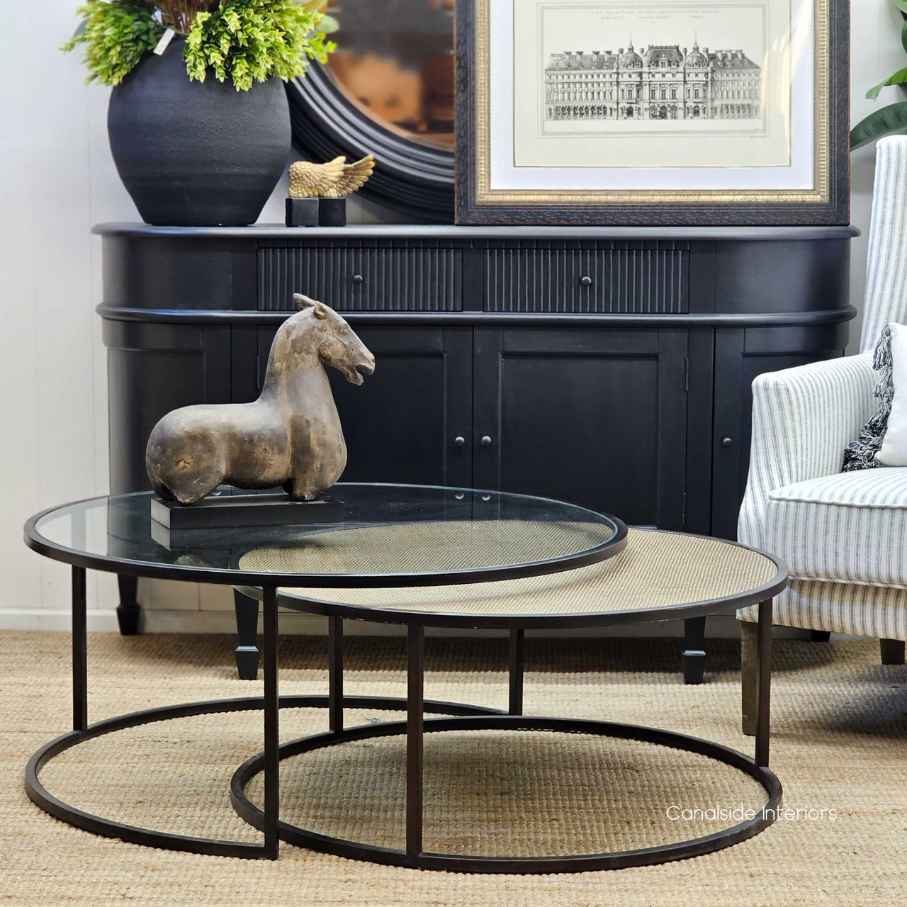 The Knox Rattan Nesting Coffee Tables, with their chic tempered glass and natural rattan tops, are a versatile choice for a Hamptons-style living room â€“ Canalside Interiors