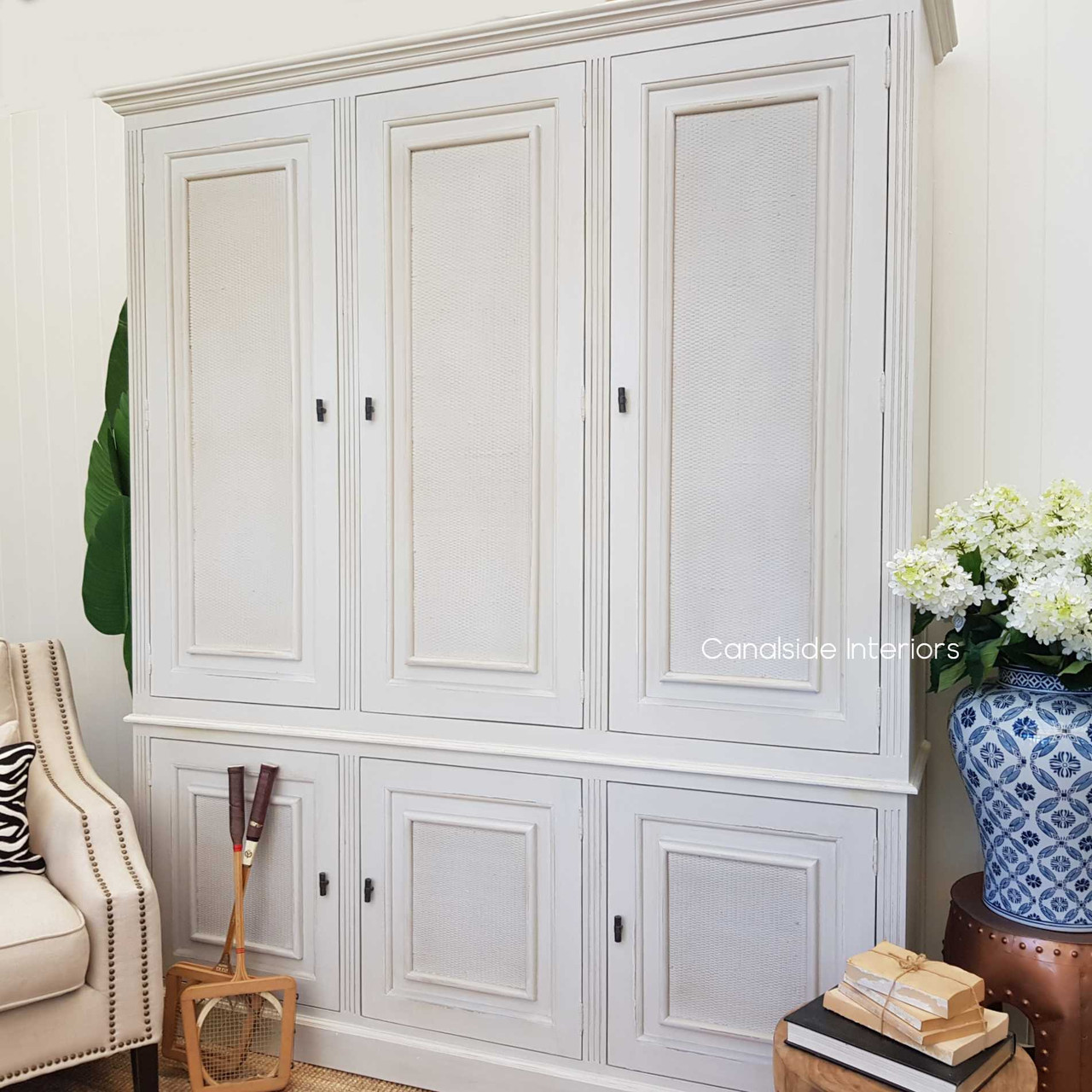 Profile view against a minimalist backdrop, emphasizing the sleek silhouette and harmonious blend with contemporary decor.