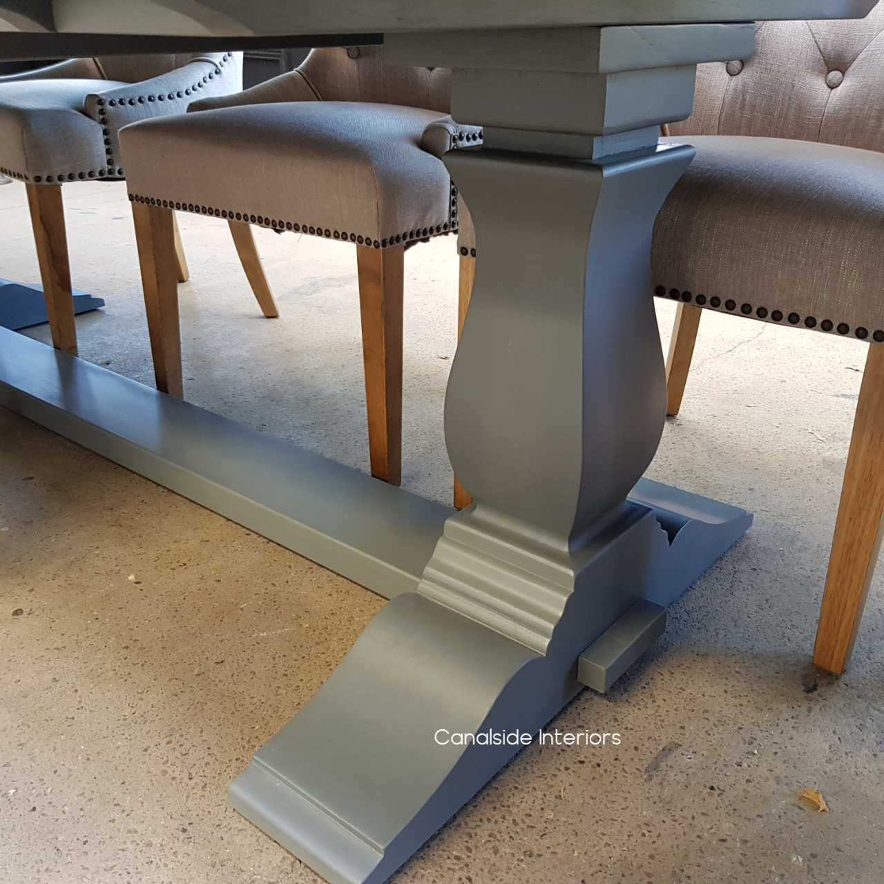 Detail of the Balmoral Table's grey base, showcasing the textured finish that complements the modern home office