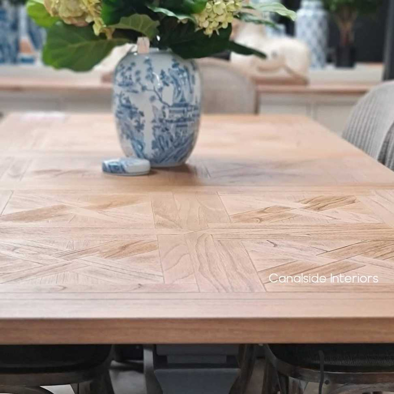 Profile shot of the Balmoral Table's leg, emphasizing the sturdy construction and elegant design fit for a luxurious bedroom setting